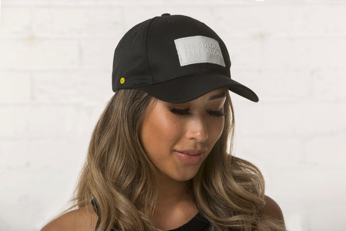 Black Eco Cap with White Leather Patch. Designed in Melbourne